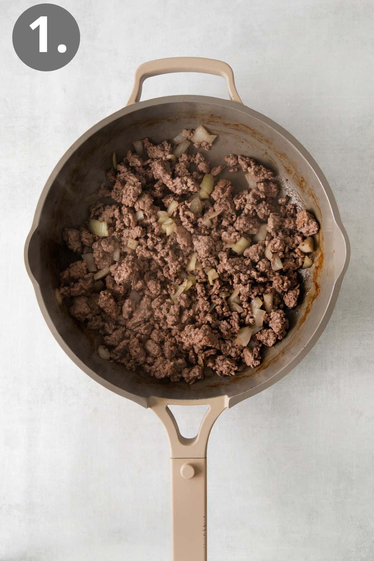 Seasoned ground beef cooked in a skillet