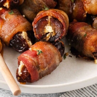 A closeup photo of bacon-wrapped dates