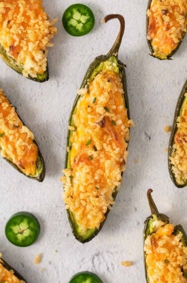 A close-up of gluten-free jalapeno poppers on a baking sheet