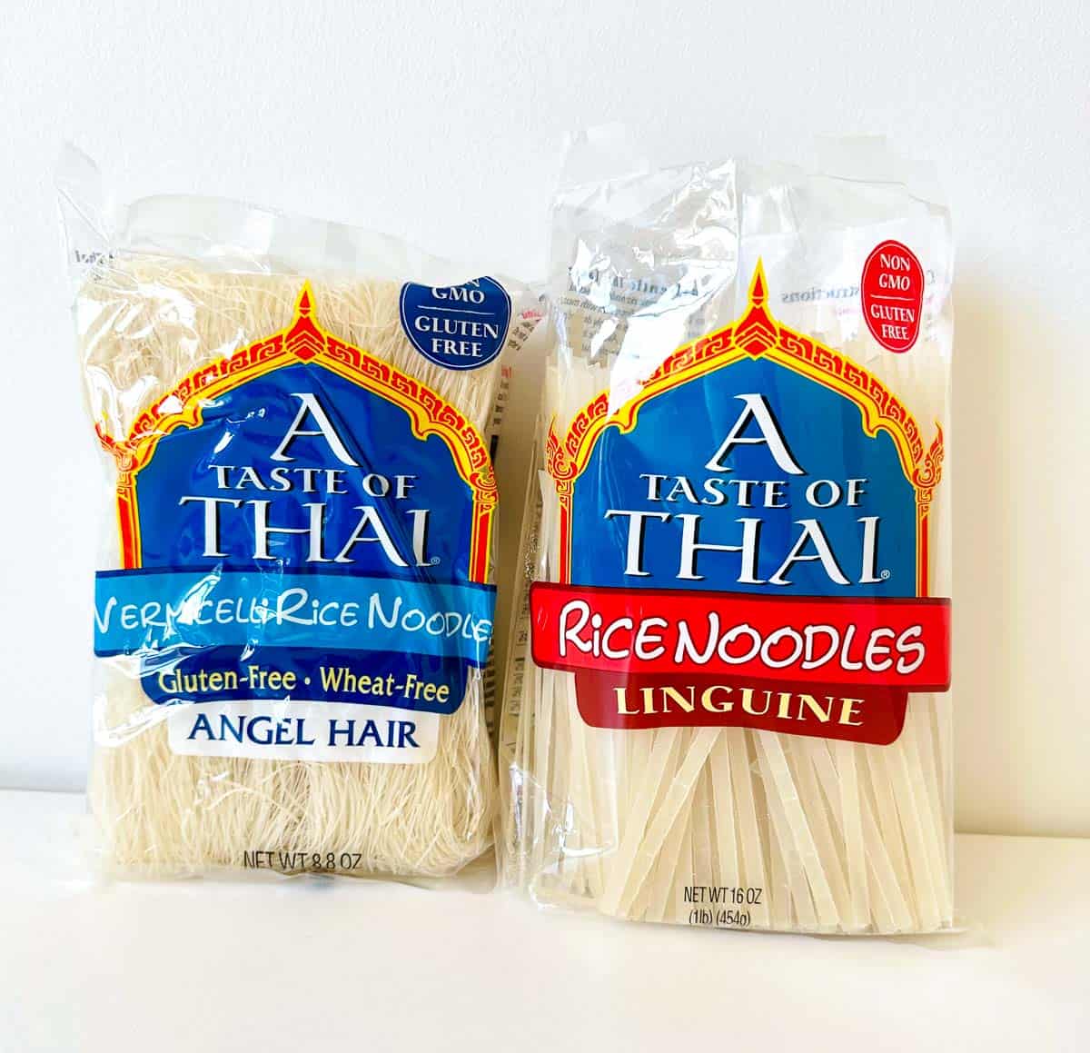 2 bags of thai rice noodles with white background