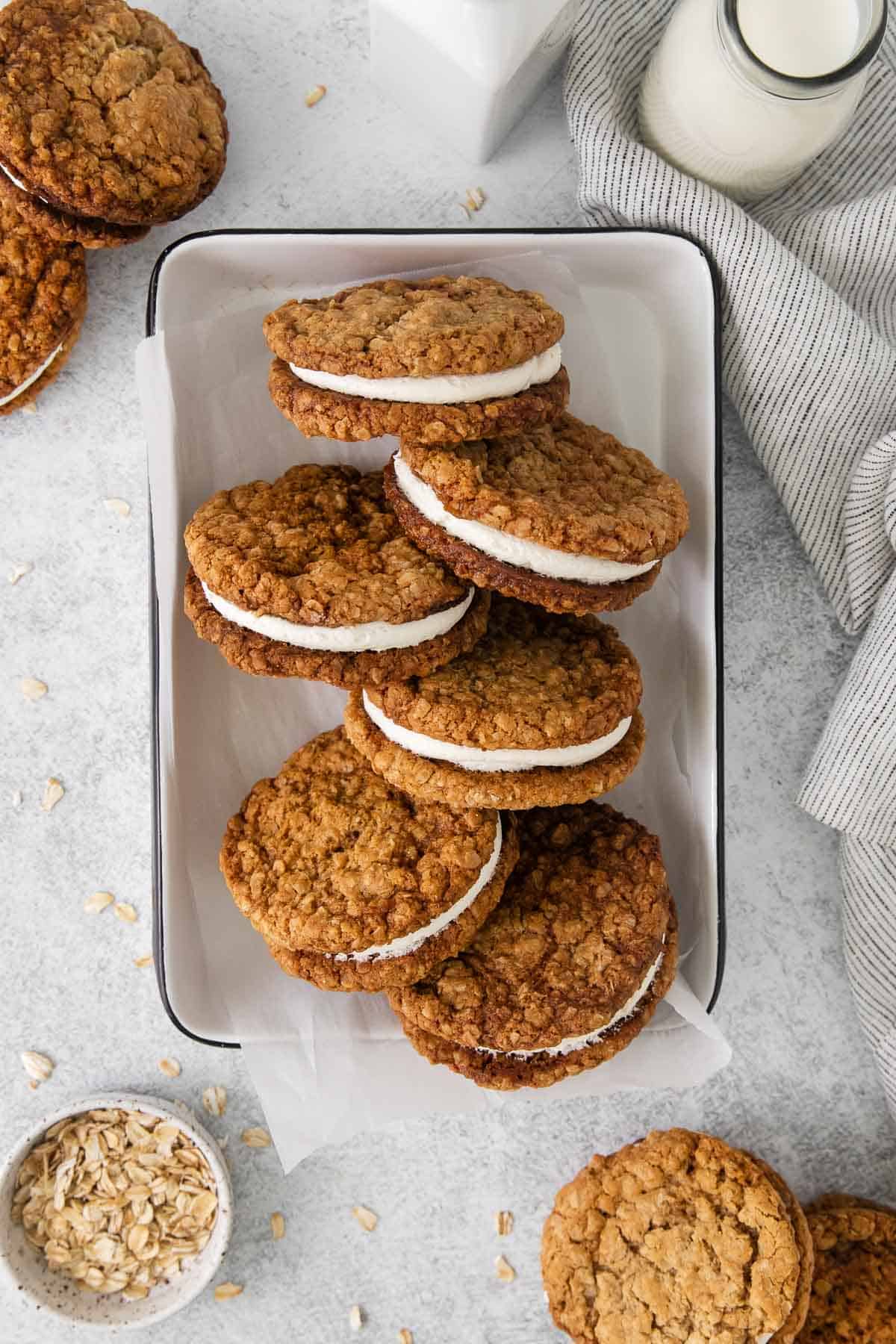 Gluten-free oatmeal cream pies in a baking dish with parchment paper