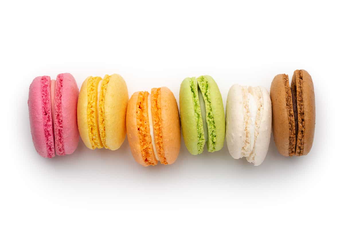 different color macarons lined up in a row