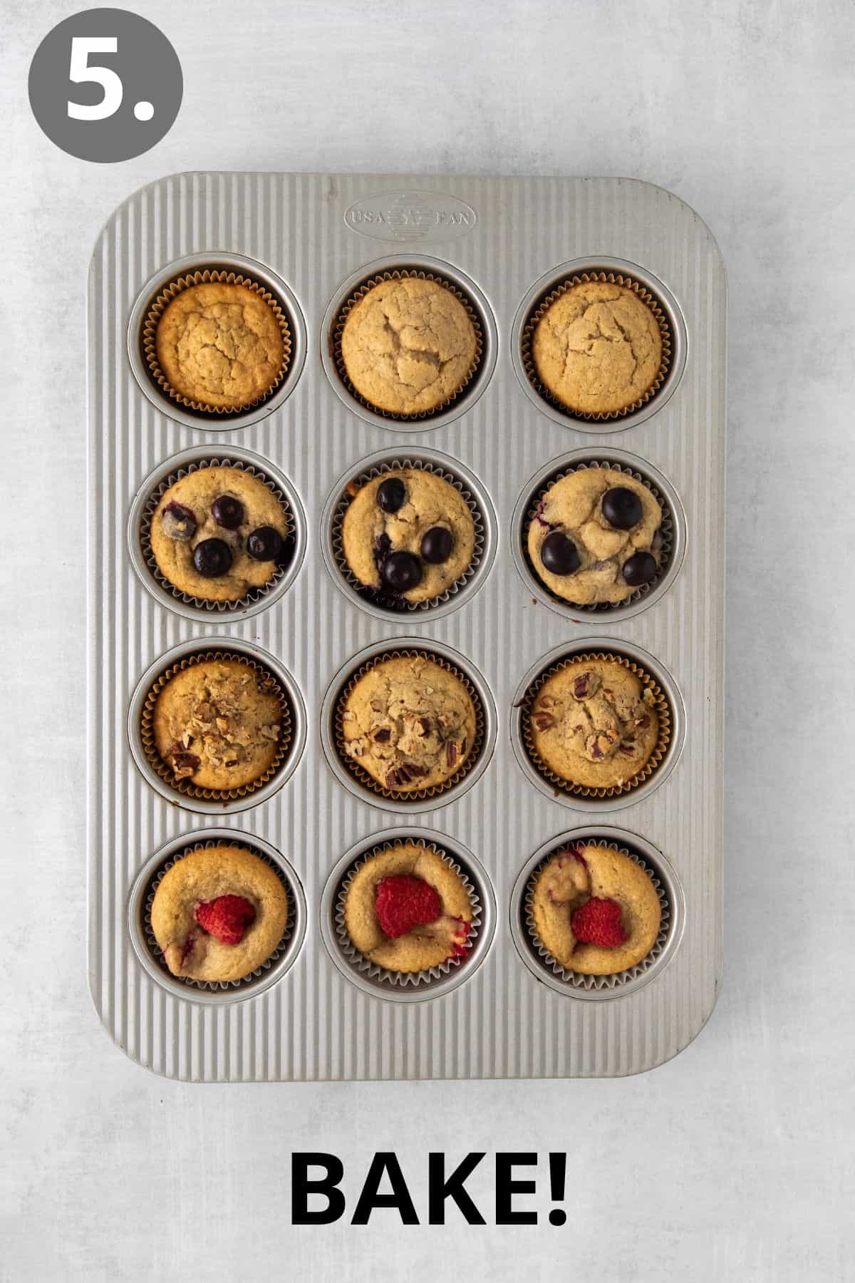 Baked oat flour muffins in a muffin tin