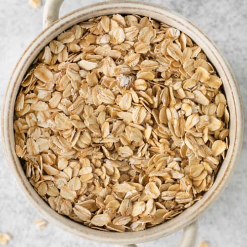 overhead shot of oats in white bowl