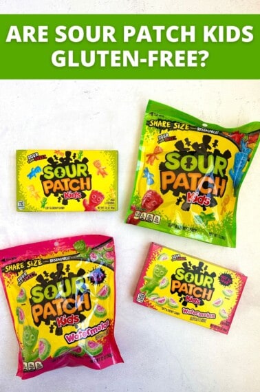 4 packages of sour patch kids on white background