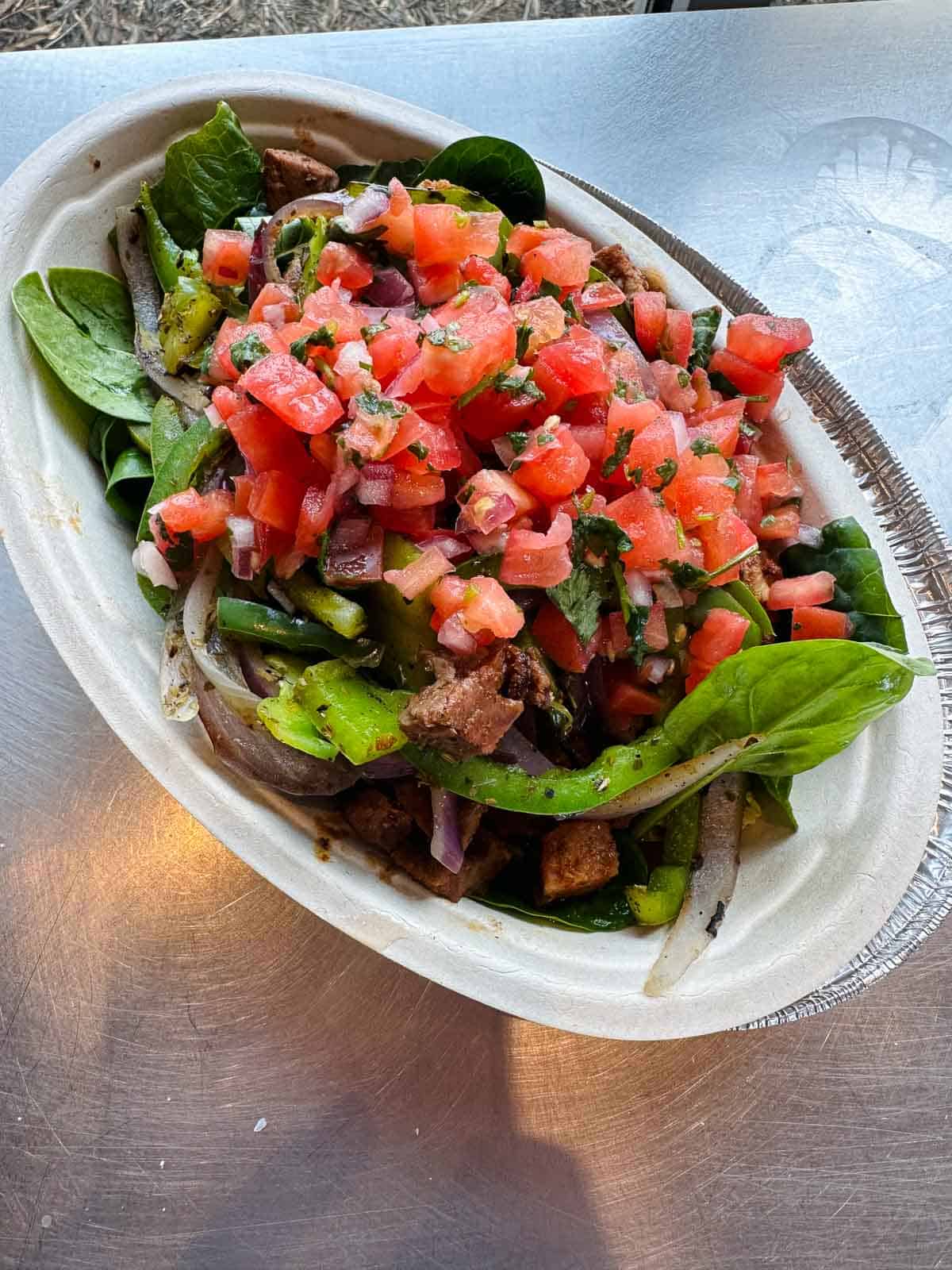 chipotle salad with tomato salsa and steak