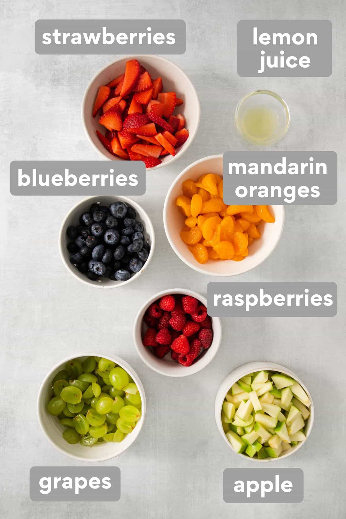 Fruit salad ingredients on a countertop