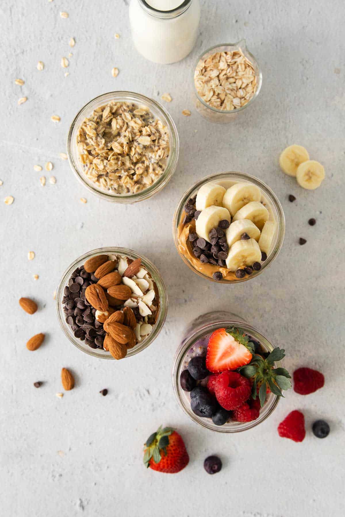 An overhead view of gluten-free overnight oats in jars