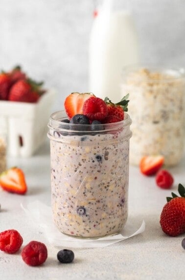 Berries and cream overnight oats in a jar