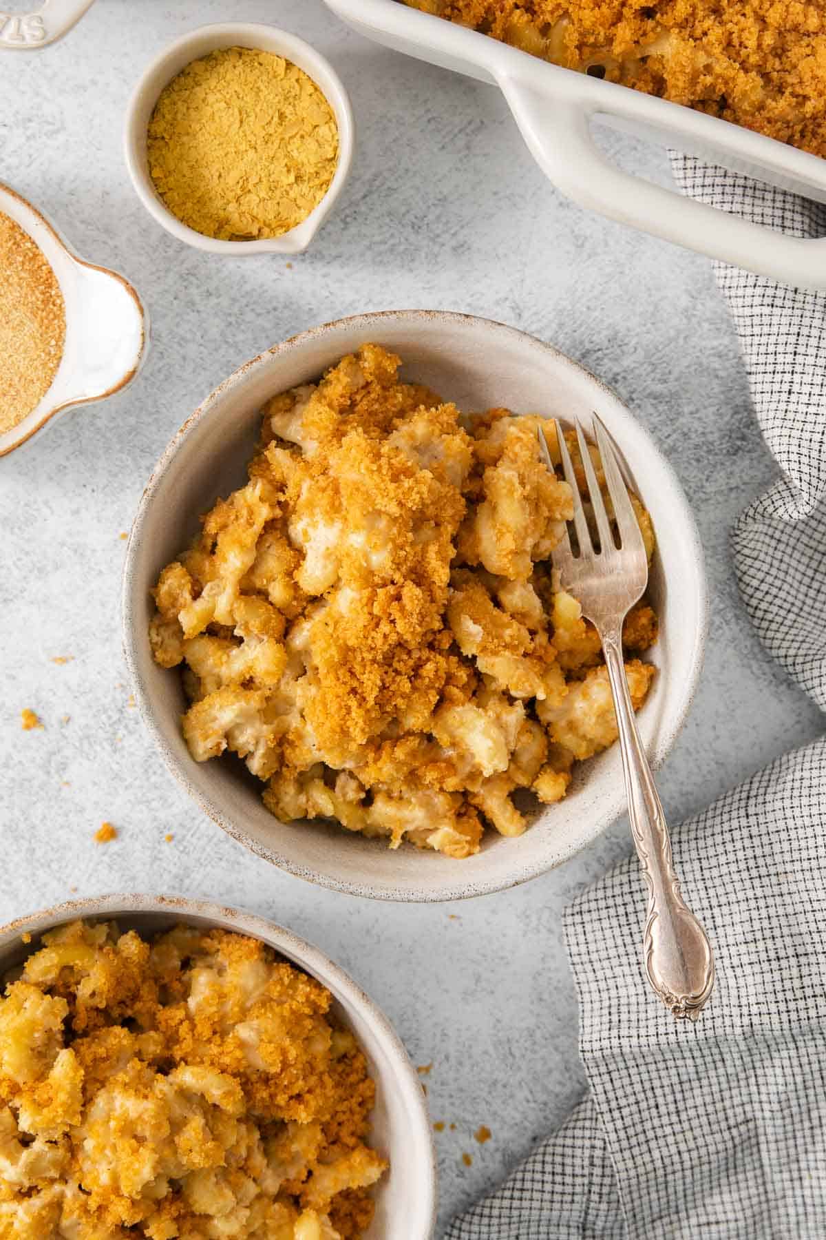 Dairy-free mac and cheese in a bowl with a fork