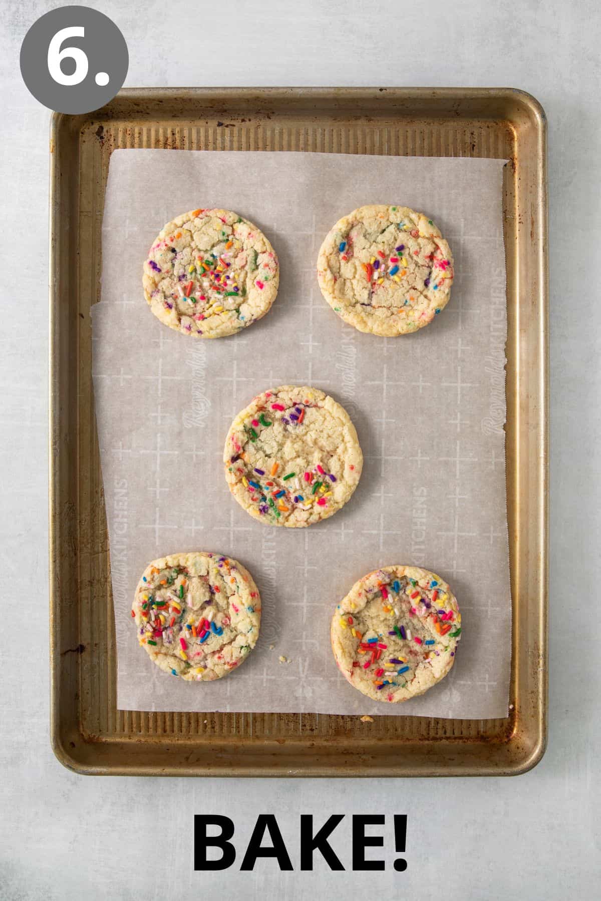 Baked sugar cookies on a cookie sheet