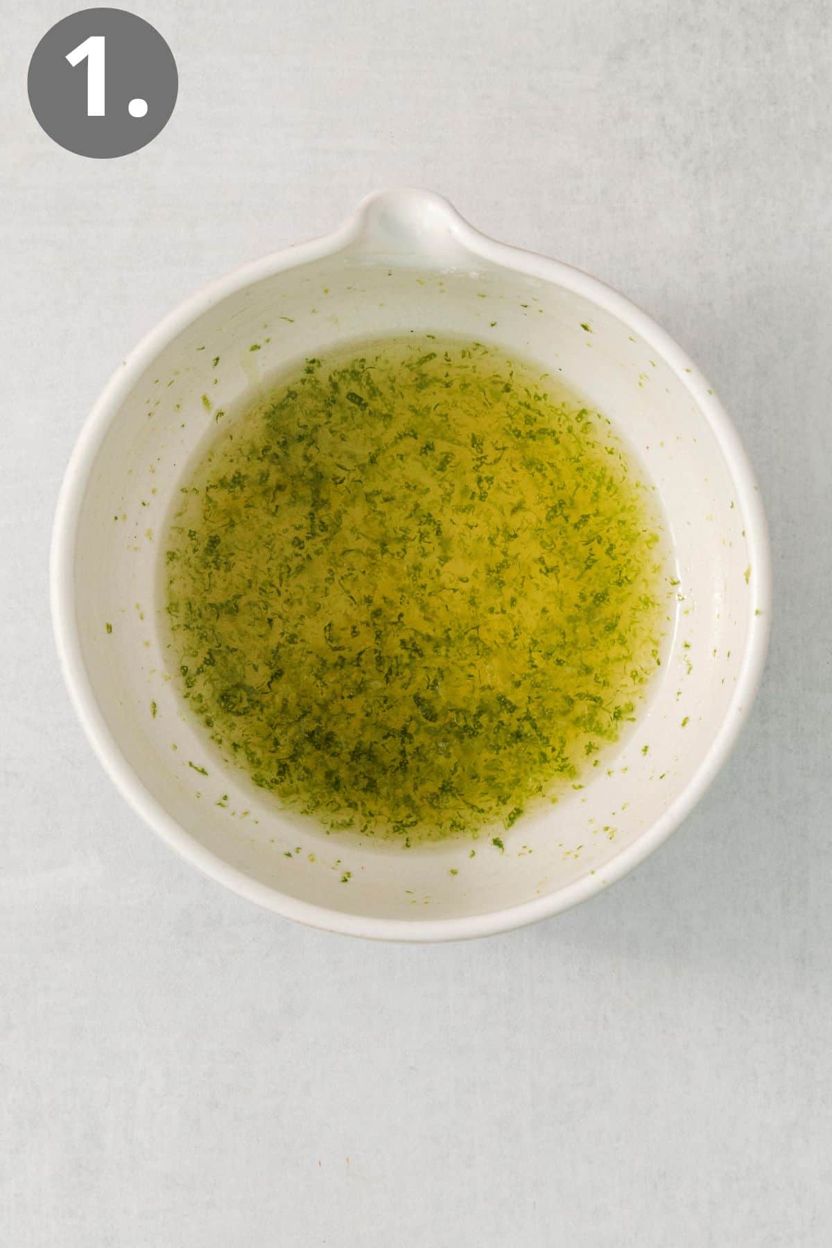 Lime zest, lime juice, and honey in a bowl