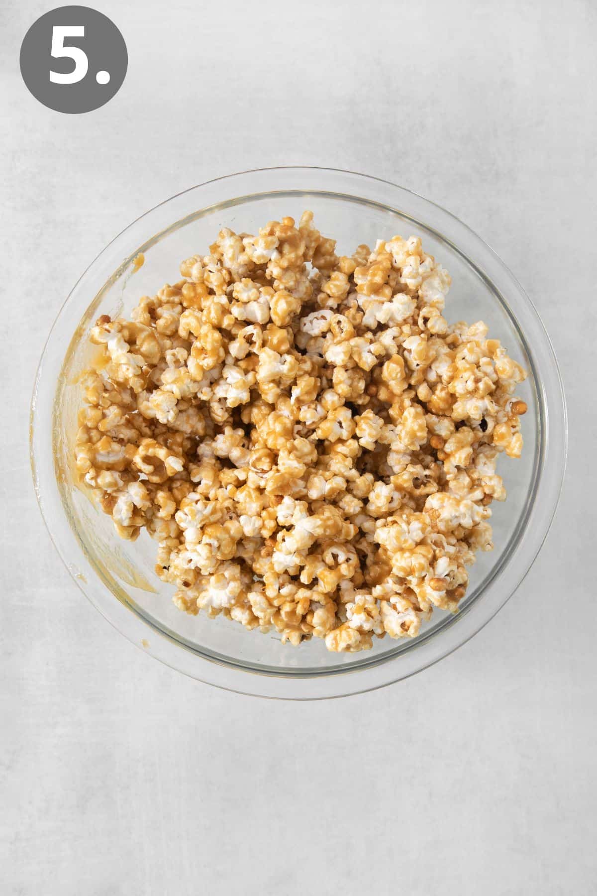Microwave caramel corn in a bowl on a countertop
