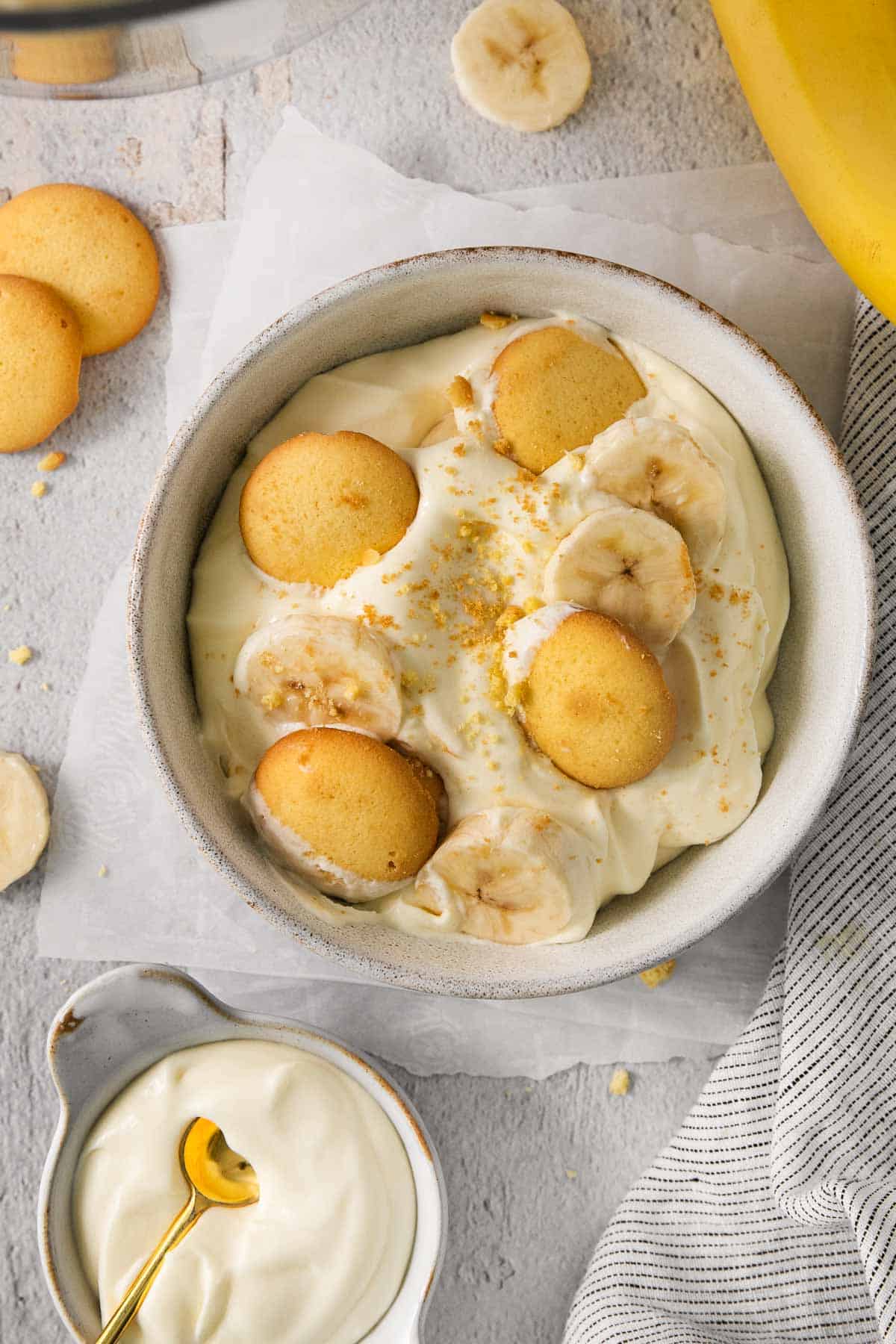Gluten-free banana pudding in a serving dish with spoon