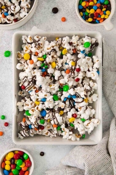 overhead shot of M&M popcorn in a baking dish