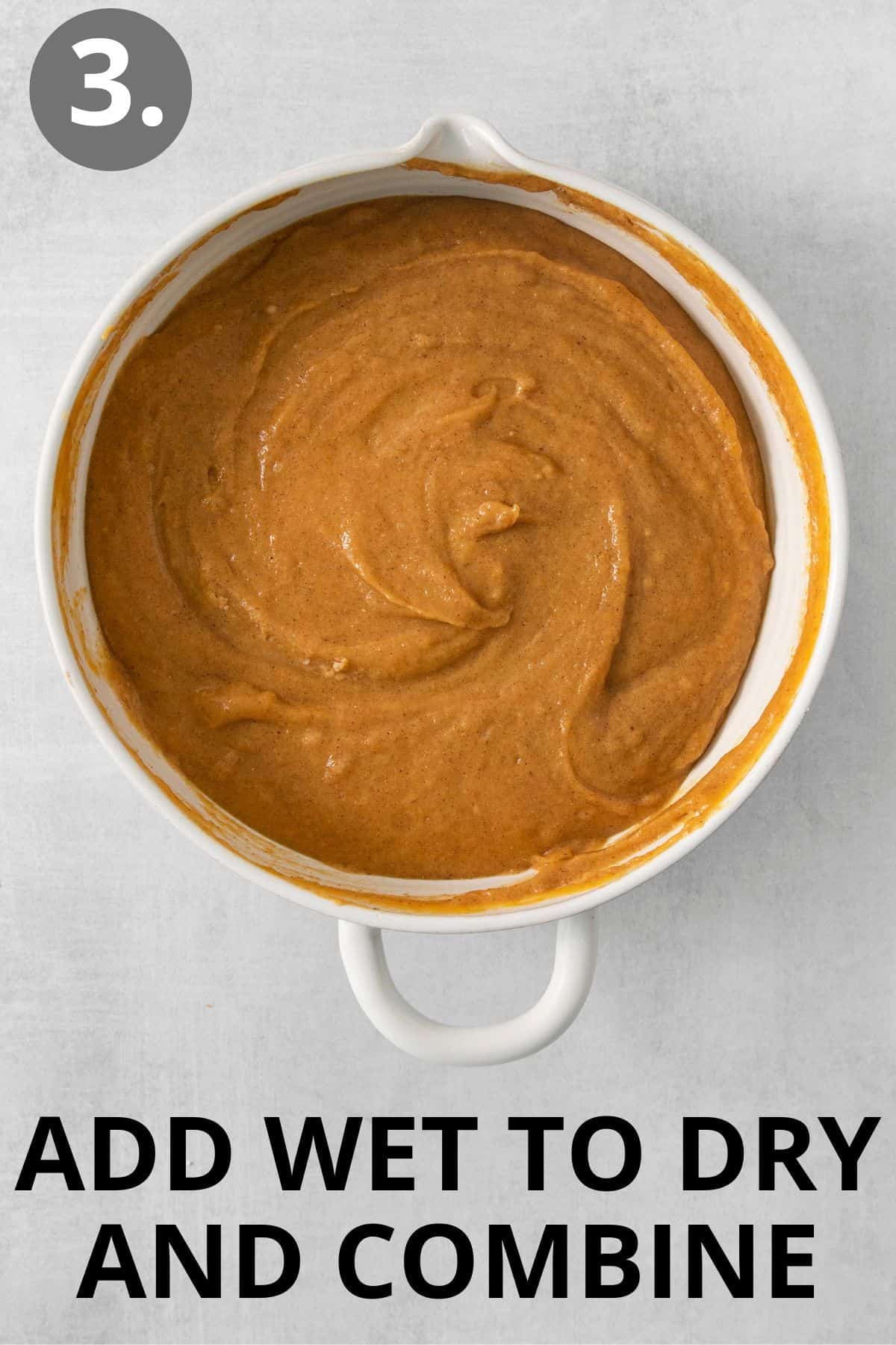 Wet and dry ingredients for gluten-free pumpkin bread combined in a bowl