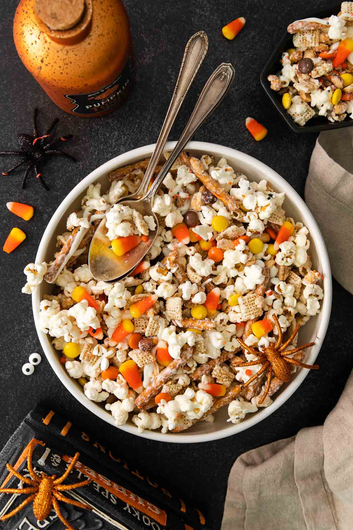 Halloween snack mix in a bowl on a decorated table