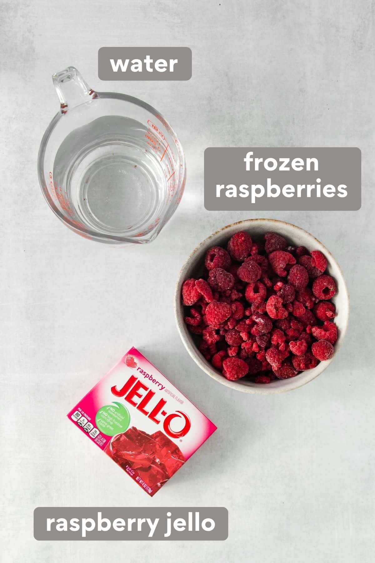 Raspberry jello filling ingredients on a countertop