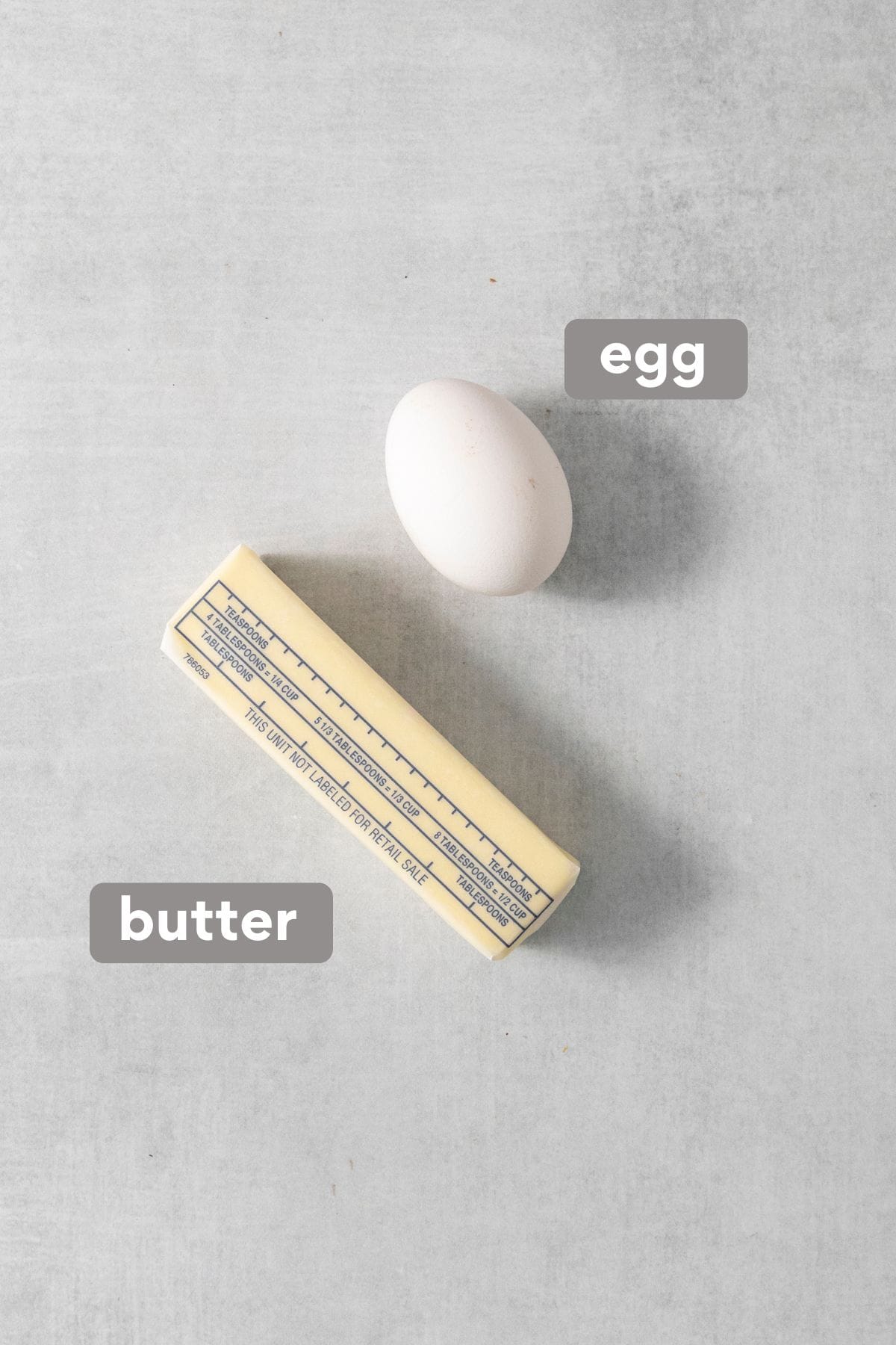 butter and egg on a countertop