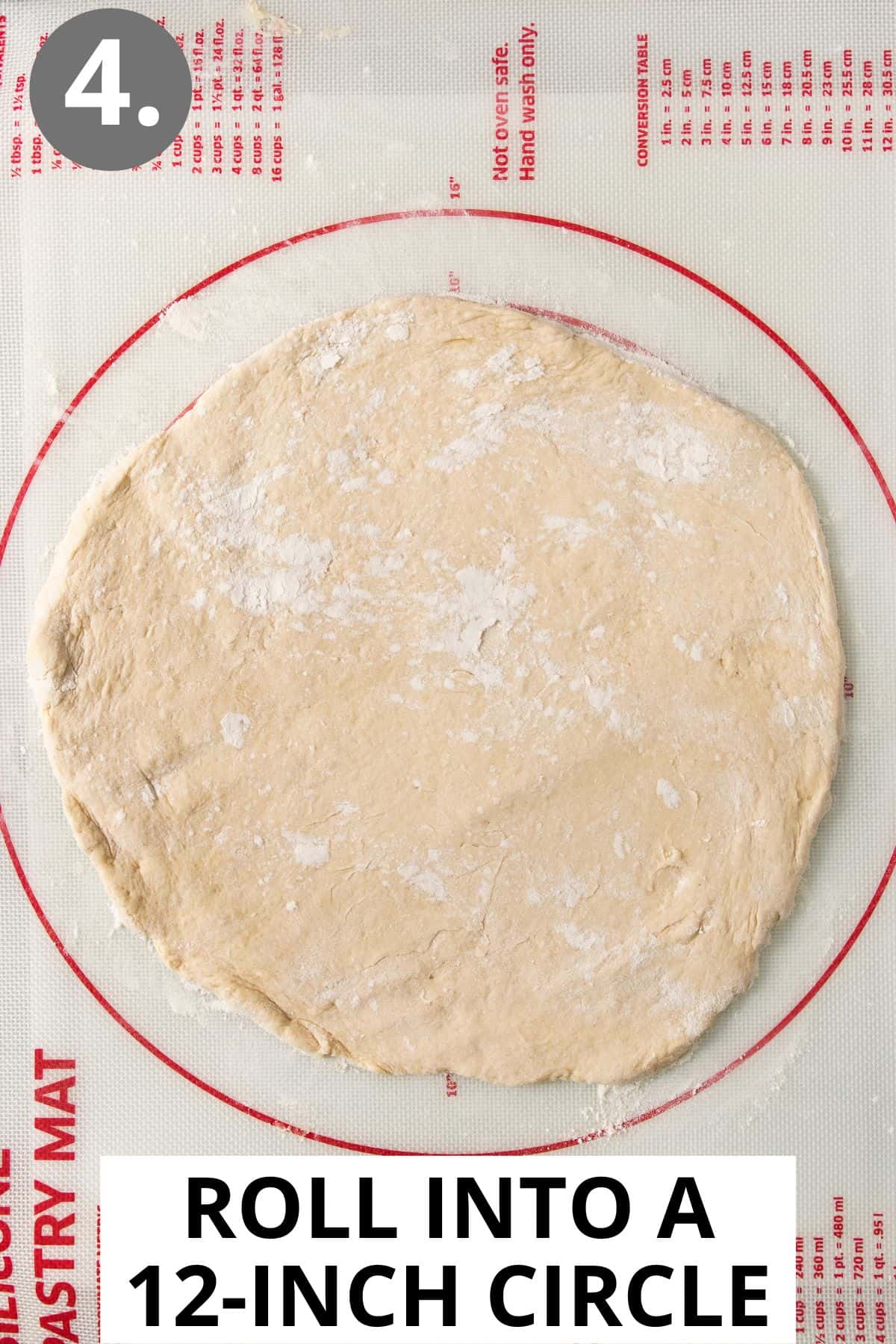 gluten-free crescent rolls dough on a baking mat, spread into a circle