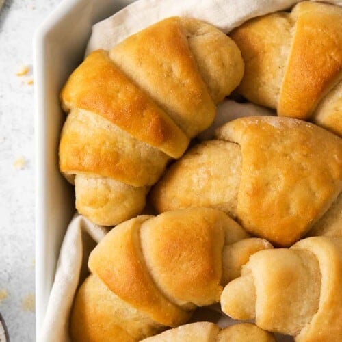 gluten-free crescent rolls in a bowl with a towel