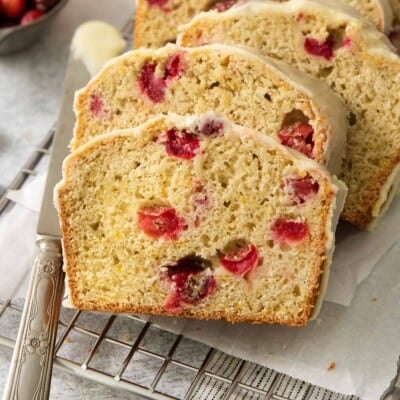 gluten-free cranberry bread sliced and arranged on a wire cooling rack
