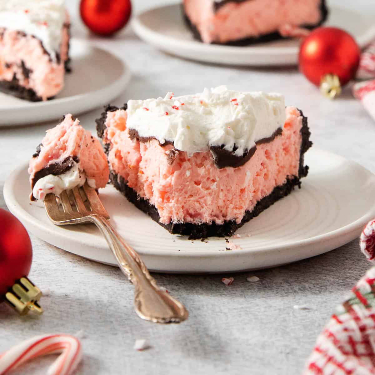 gluten-free peppermint pie on a plate with a fork next to it