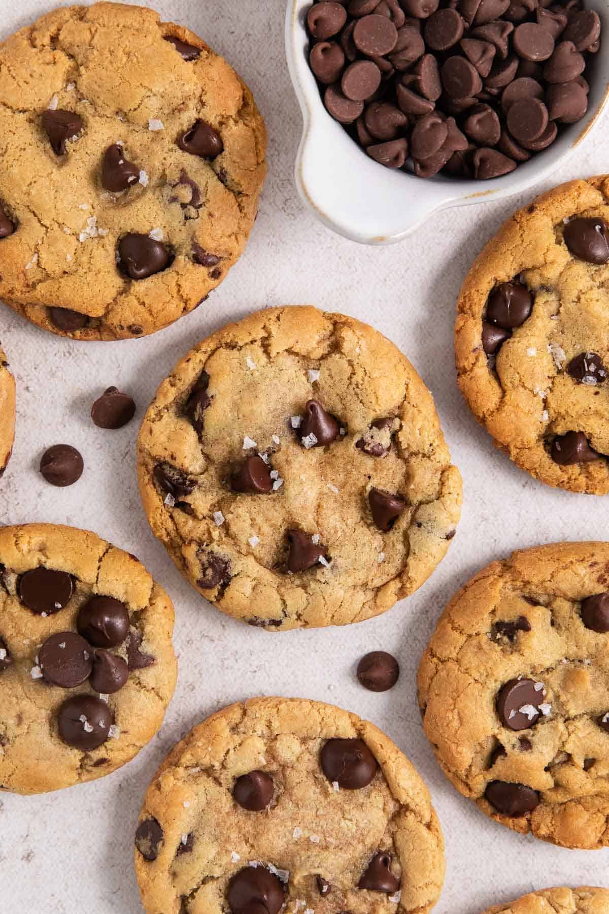 close up shot of gluten-free chocolate chip cookies sprinkled with salt
