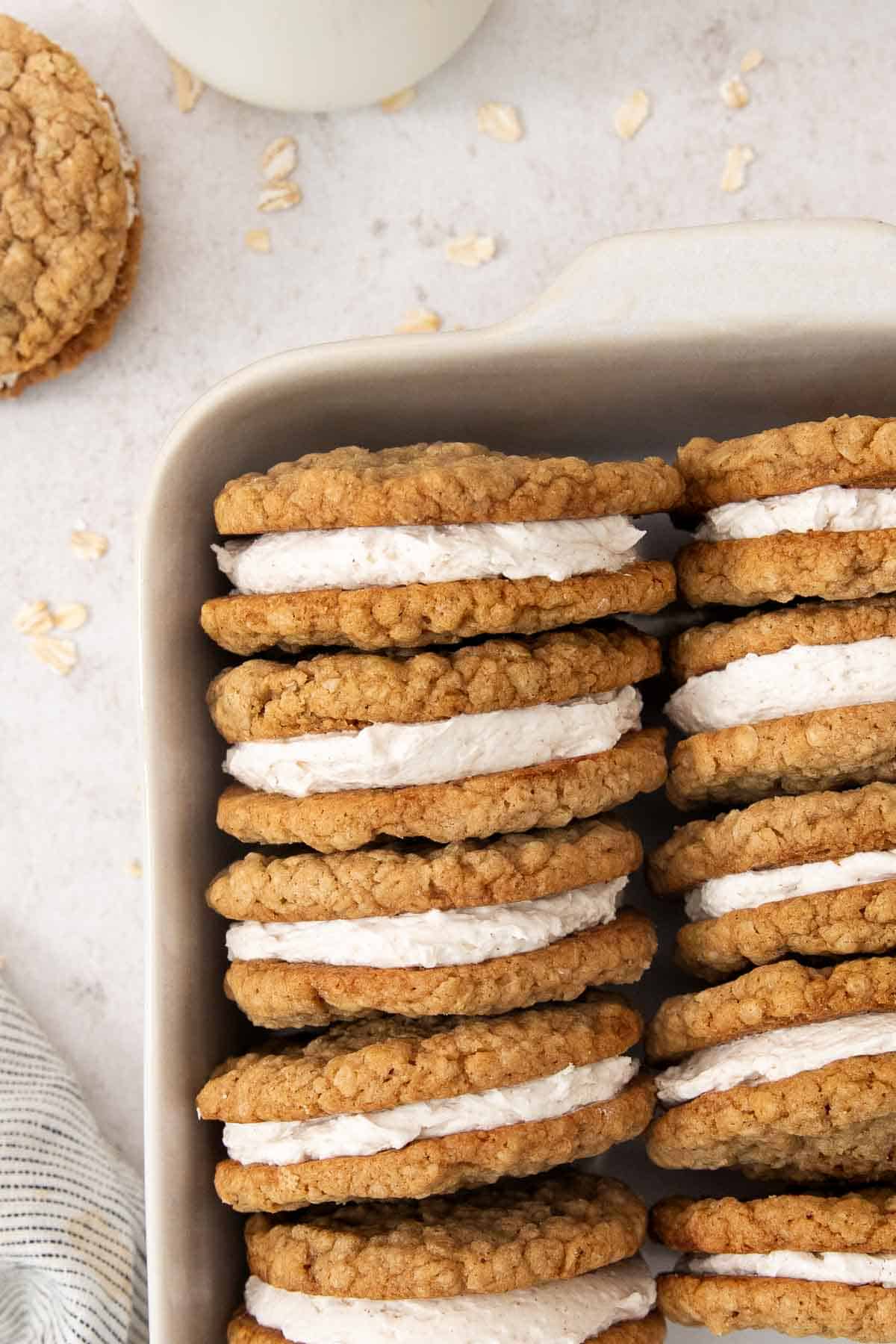 rows eggnog oatmeal cream pies on their sides in a baking dish.
