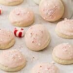peppermint meltaways with pink icing and candy cane pieces.