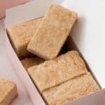 shortbread bars in a box with one propped up out of the box.