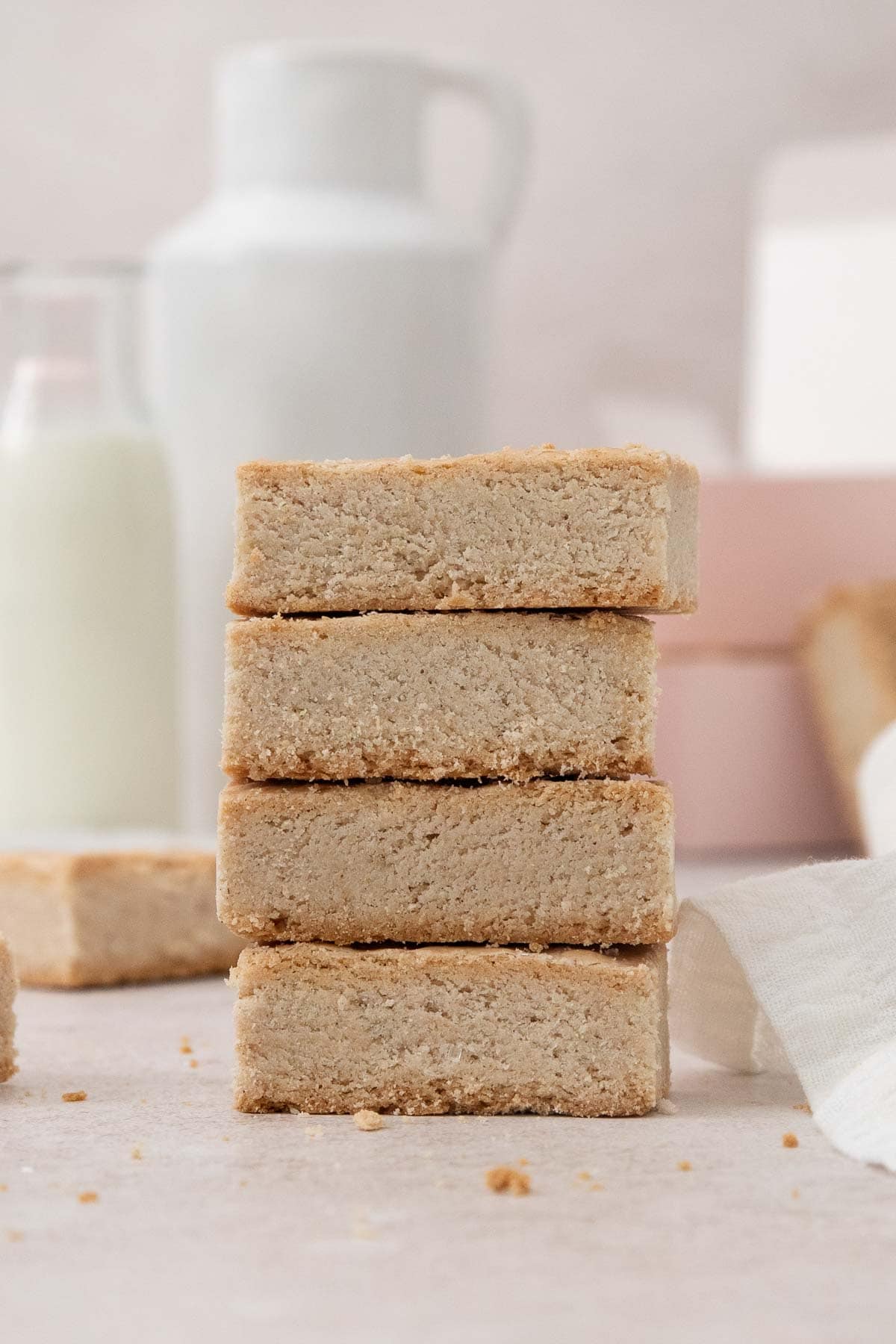 slices of shortbread stacked in a tower on a countertop.