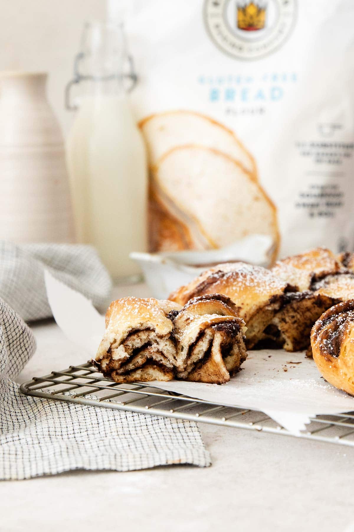 a piece of Nutella star bread pulled away showing the inside layers.
