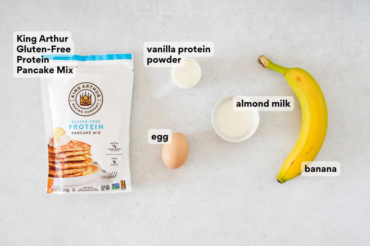 Gluten-Free Banana Protein Pancakes ingredients on a countertop.