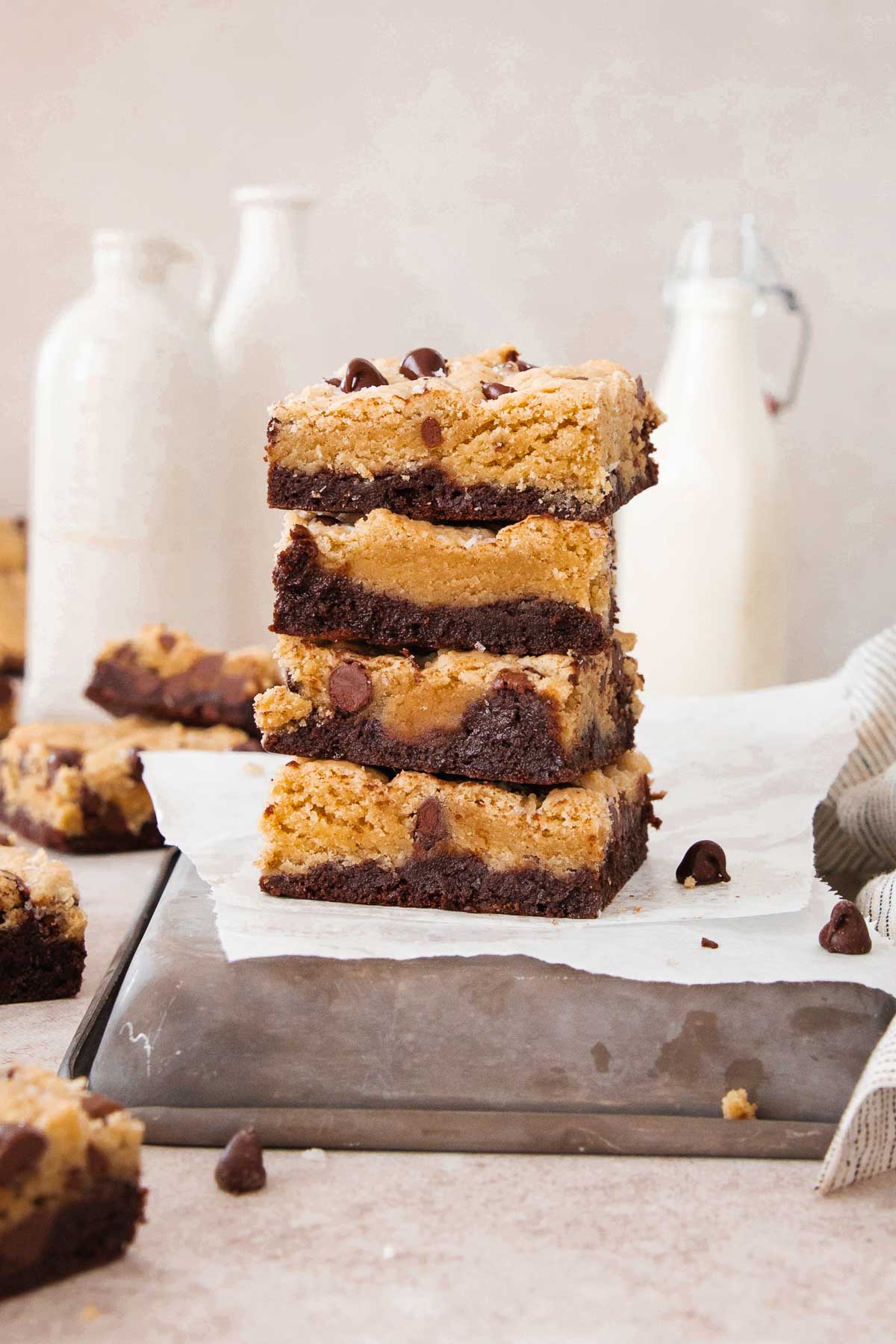 a stack of brookie slices on an overturned baking pan.