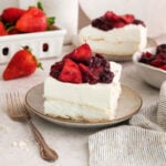 cherries and berries on a meringue base with whipped mascarpone cheese.